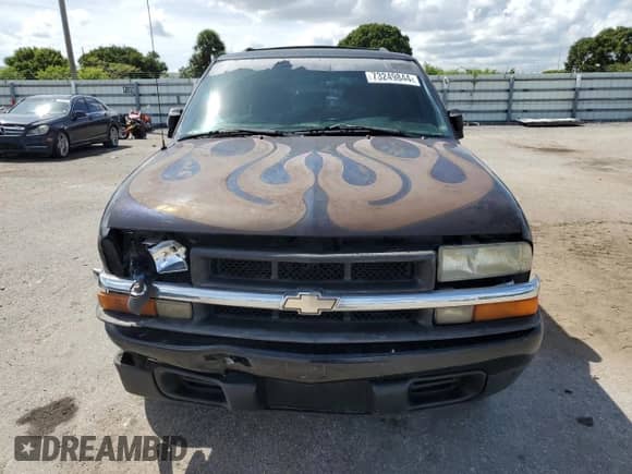 2000 Chevrolet Blazer LS with VIN 1GNCS13W62K142736, listed as a Copart auction lot 73249844 with 141,788 mi miles and Salvage title. Bid and sale history available at DreamBid. Image 5.