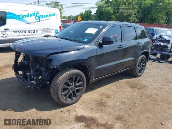 2020 Jeep Grand Cherokee Laredo E with VIN 1C4RJFAG3LC208766, listed as a IAAI auction lot 42475923 with 103,077 mi miles and . Bid and sale history available at DreamBid. Image 18.