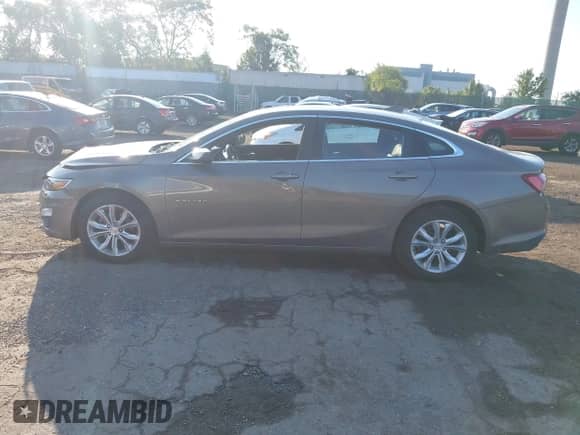 2020 Chevrolet Malibu LT with VIN 1G1ZD5ST9LF123497, listed as a IAAI auction lot 43262812 with 103,064 mi miles and . Bid and sale history available at DreamBid. Image 14.