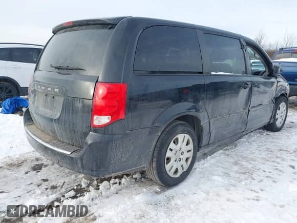 2014 Dodge Grand Caravan SXT with VIN 2C4RDGBGXER138141, listed as a IAAI auction lot 41201505 with 156,445 mi miles and . Bid and sale history available at DreamBid. Image 4.