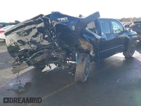 2024 Toyota Tacoma SR5 with VIN 3TMLB5JNXRM049327, listed as a IAAI auction lot 40906568 with 691 mi miles and . Bid and sale history available at DreamBid. Image 4.