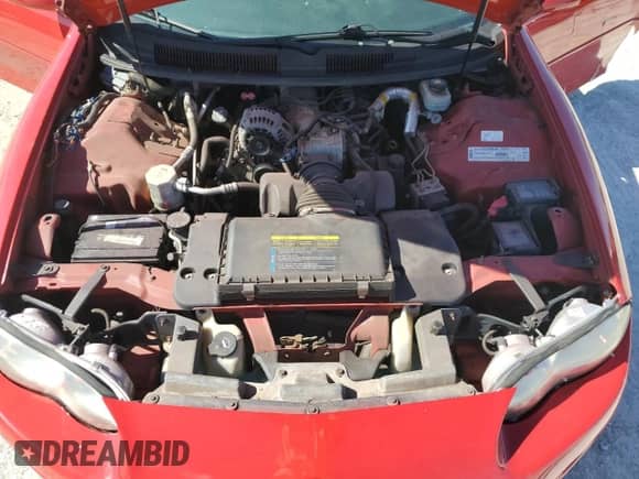 2002 Chevrolet Camaro z VIN 2G1FP22KX22163698, wystawiony jako Copart lot #88935865 z przebiegiem 114 574 mil mil oraz Szkoda całkowita • Salvage title. Historia ofert i sprzedaży dostępna na DreamBid. Obrazek 11.