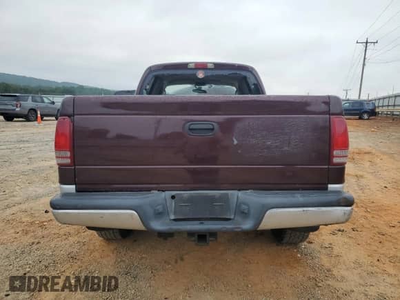 2004 Dodge Dakota SLT with VIN 1D7HG48N94S688828, listed as a Copart auction lot 69864515 with 246,909 mi miles and Salvage title. Bid and sale history available at DreamBid. Image 6.