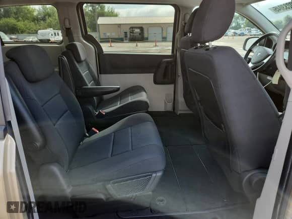 2010 Dodge Grand Caravan SXT с VIN 2D4RN5D19AR220191, выставлен на аукционе Copart как лот 69233045 с пробегом 58 716 миль миль и Списание • Salvage title. История ставок и продаж доступна на DreamBid. Изображение 11.