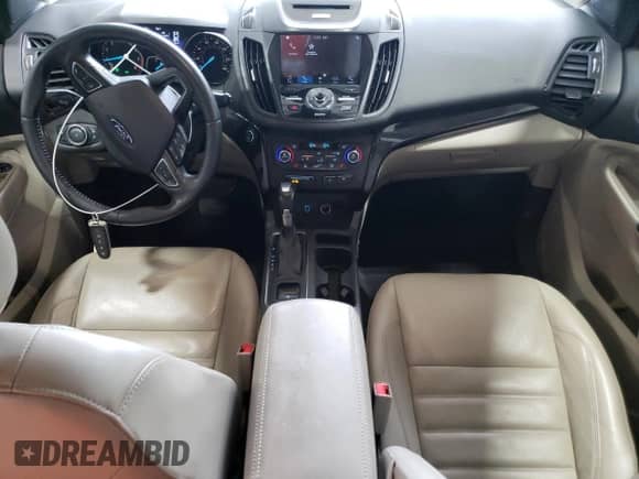 2017 Ford Escape Titanium with VIN 1FMCU9J92HUB62618, listed as a Copart auction lot 61932215 with 122,189 mi miles and Salvage title. Bid and sale history available at DreamBid. Image 8.