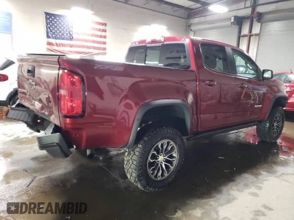 2020 Chevrolet Colorado 4WD ZR2 with VIN 1GCGTEEN6L1108483, listed as a Copart auction lot 87216404 with 27,520 mi miles and Salvage title. Bid and sale history available at DreamBid. Image 3.