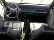 1994 Jeep Wrangler S с VIN 1J4FY19P5RP408307, выставлен на аукционе Copart как лот 63796575 с пробегом 168 480 миль миль и Чистый • Clean title. История ставок и продаж доступна на DreamBid. Изображение 8.