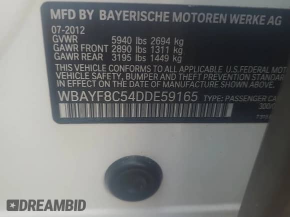 2013 BMW 7 Series 750Li xDrive with VIN WBAYF8C54DDE59165, listed as a Copart auction lot 70009505 with 230,903 mi miles and Salvage title. Bid and sale history available at DreamBid. Image 13.