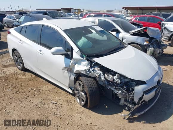 2021 Toyota Prius Limited with VIN JTDKAMFU9M3130578, listed as a IAAI auction lot 43236398 with 258,496 mi miles and . Bid and sale history available at DreamBid. Image 1.