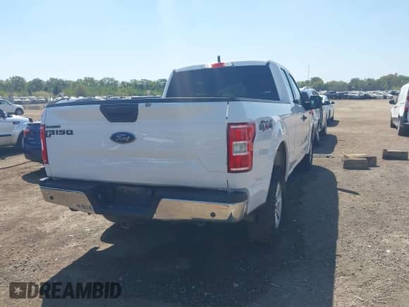 2018 Ford F-150 XL z VIN 1FTFX1E51JKE82628, wystawiony jako IAAI lot #43201475 z przebiegiem 79 461 mil mil oraz . Historia ofert i sprzedaży dostępna na DreamBid. Obrazek 16.