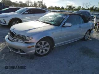 2005 BMW 3 Series 325Ci with VIN WBABW33405PL39974, listed as a Copart auction lot 82324715 with 86,304 mi miles and Salvage title. Bid and sale history available at DreamBid. Image 1.