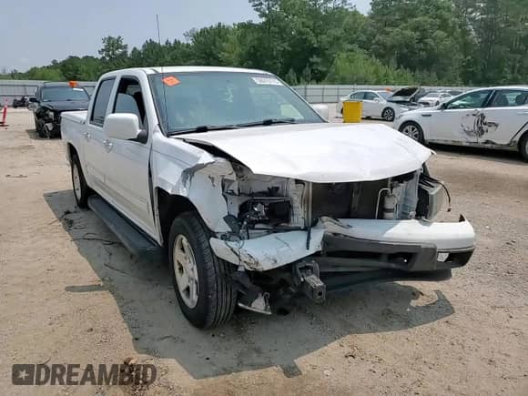 2012 Chevrolet Colorado 1LT z VIN 1GCDSCFE1C8102199, wystawiony jako Copart lot #59015115 z przebiegiem Nie podano mil oraz Szkoda całkowita • Salvage title. Historia ofert i sprzedaży dostępna na DreamBid. Obrazek 14.