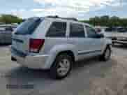 2009 Jeep Grand Cherokee Laredo с VIN 1J8HR48P49C552669, выставлен на аукционе Copart как лот 58040595 с пробегом 149 459 миль миль и Списание • Salvage title. История ставок и продаж доступна на DreamBid. Изображение 3.