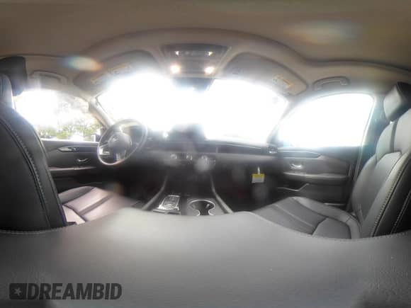 2025 Honda Pilot Touring with VIN 5FNYG2H70SB011614, listed as a IAAI auction lot 42205848 with 37,719 mi miles and . Bid and sale history available at DreamBid. Image 18.