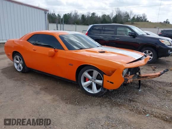 2012 Dodge Challenger SRT-8 392 с VIN 2C3CDYCJ2CH118818, выставлен на аукционе IAAI как лот 41779758 с пробегом 103 816 миль миль и . История ставок и продаж доступна на DreamBid. Изображение 1.