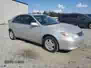 2002 Toyota Camry LE z VIN 4T1BE32K82U006520, wystawiony jako Copart lot #82041025 z przebiegiem 313 302 mil mil oraz Szkoda całkowita • Salvage title. Historia ofert i sprzedaży dostępna na DreamBid. Obrazek 4.