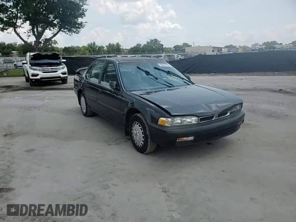 1991 Honda Accord LX z VIN JHMCB7659MC039465, wystawiony jako Copart lot #55810155 z przebiegiem 206 192 mil mil oraz Szkoda całkowita • Salvage title. Historia ofert i sprzedaży dostępna na DreamBid. Obrazek 13.