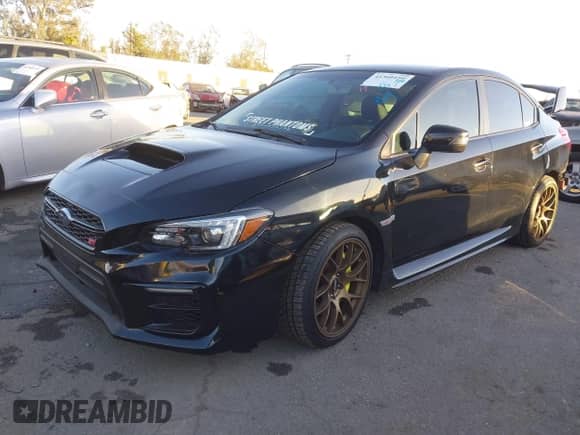 2020 Subaru WRX STI with VIN JF1VA2S65L9830771, listed as a IAAI auction lot 41360199 with 39,566 mi miles and . Bid and sale history available at DreamBid. Image 2.
