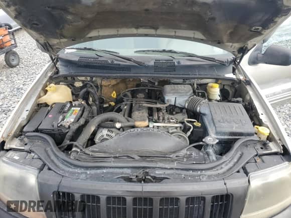 2004 Jeep Grand Cherokee Laredo with VIN 1J4GX48S04C301566, listed as a Copart auction lot 86159575 with 195,483 mi miles and Salvage title. Bid and sale history available at DreamBid. Image 12.