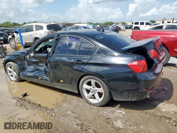 2014 BMW 3 Series 320i with VIN WBA3B1C59EK134700, listed as a Copart auction lot 60987785 with 149,684 mi miles and Salvage title. Bid and sale history available at DreamBid. Image 2.