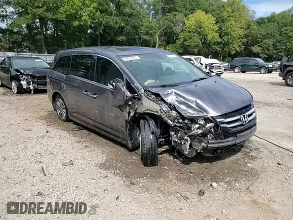 2015 Honda Odyssey Touring Elite с VIN 5FNRL5H9XFB119778, выставлен на аукционе Copart как лот 84543015 с пробегом 136 956 миль миль и Списание • Salvage title. История ставок и продаж доступна на DreamBid. Изображение 14.