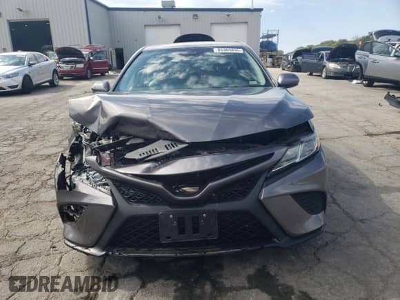 2019 Toyota Camry Hybrid SE с VIN 4T1B21HK2KU521372, выставлен на аукционе Copart как лот 85365895 с пробегом 79 115 миль миль и Списание • Salvage title. История ставок и продаж доступна на DreamBid. Изображение 5.