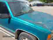1995 GMC Sierra 1500 z VIN 1GTEC14K9SZ528472, wystawiony jako IAAI lot #42264927 z przebiegiem 108 792 mil mil oraz . Historia ofert i sprzedaży dostępna na DreamBid. Obrazek 12.