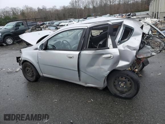 2009 Chevrolet Aveo 1LT z VIN KL1TD66E79B621722, wystawiony jako Copart lot #48866424 z przebiegiem Nie podano mil oraz Szkoda całkowita • Salvage title. Historia ofert i sprzedaży dostępna na DreamBid. Obrazek 2.