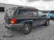 1999 Jeep Grand Cherokee Laredo с VIN 1J4G258S4XC577449, выставлен на аукционе Copart как лот 66556115 с пробегом 220 256 миль миль и Чистый • Clean title. История ставок и продаж доступна на DreamBid. Изображение 3.