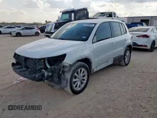 2014 Volkswagen Tiguan SE with VIN WVGAV3AX1EW602506, listed as a Copart auction lot 85289025 with 117,596 mi miles and Salvage title. Bid and sale history available at DreamBid. Image 1.