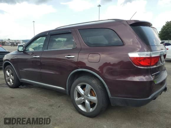 2012 Dodge Durango Citadel with VIN 1C4SDJET1CC188309, listed as a Copart auction lot 65580995 with 188,734 mi miles and Salvage title. Bid and sale history available at DreamBid. Image 2.
