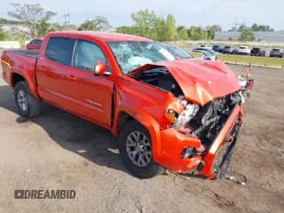 2018 Toyota Tacoma SR5 with VIN 5TFAZ5CN4JX064016, listed as a IAAI auction lot 43222144 with 74,935 mi miles and . Bid and sale history available at DreamBid. Image 1.