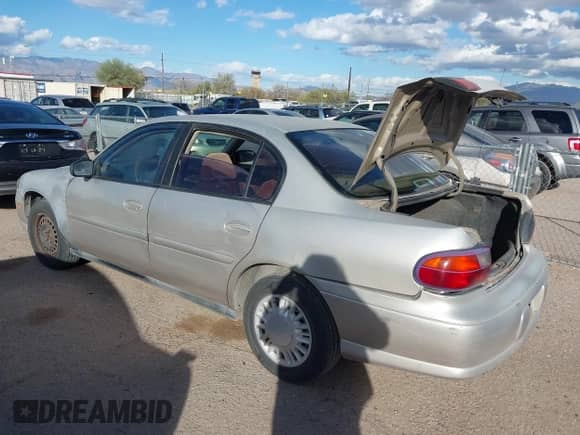 2004 Chevrolet Malibu Classic with VIN 1G1ND52F34M589464, listed as a IAAI auction lot 41566346 with 128,084 mi miles and . Bid and sale history available at DreamBid. Image 3.