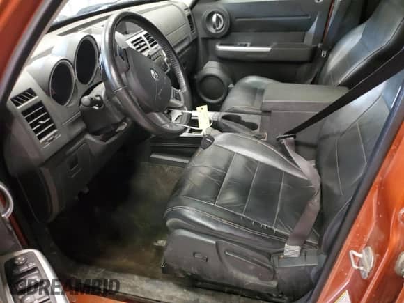 2011 Dodge Nitro Shock z VIN 1D4PU7GX8BW590952, wystawiony jako Copart lot #64893755 z przebiegiem 135 449 mil mil oraz Szkoda całkowita • Salvage title. Historia ofert i sprzedaży dostępna na DreamBid. Obrazek 7.