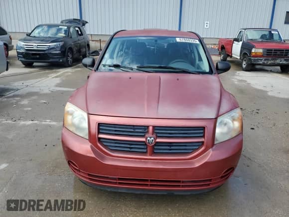 2007 Dodge Caliber with VIN 1B3JB28B97D503059, listed as a Copart auction lot 67860335 with 169,452 mi miles and Salvage title. Bid and sale history available at DreamBid. Image 5.