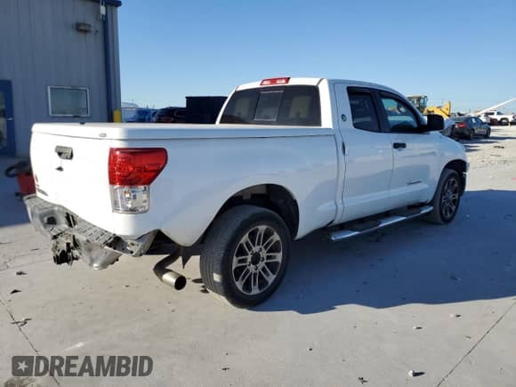 2012 Toyota Tundra z VIN 5TFRM5F13CX040352, wystawiony jako Copart lot #82679795 z przebiegiem 131 423 mil mil oraz Szkoda całkowita • Salvage title. Historia ofert i sprzedaży dostępna na DreamBid. Obrazek 3.