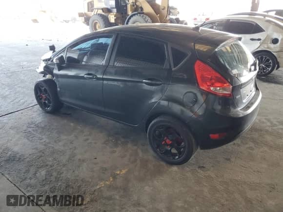 2011 Ford Fiesta SES with VIN 3FADP4FJ1BM196847, listed as a Copart auction lot 82233515 with 235,816 mi miles and Salvage title. Bid and sale history available at DreamBid. Image 2.