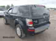 2008 Mercury Mariner Premier with VIN 4M2CU97178KJ44773, listed as a IAAI auction lot 43028644 with 186,934 mi miles and . Bid and sale history available at DreamBid. Image 3.