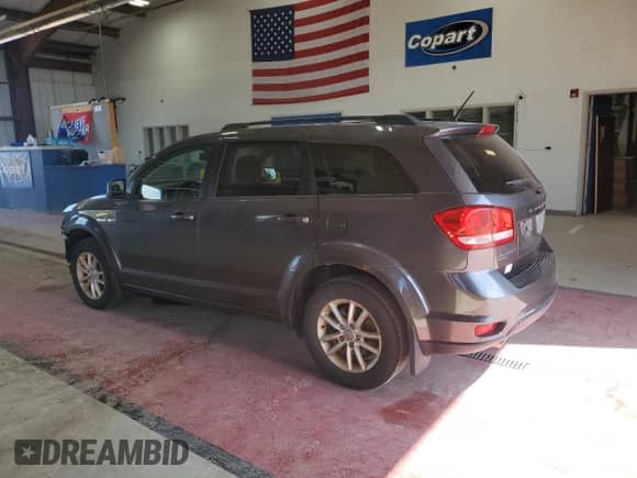 2015 Dodge Journey SXT with VIN 3C4PDDBG0FT651497, listed as a Copart auction lot 71617105 with 92,765 mi miles and Salvage title. Bid and sale history available at DreamBid. Image 2.