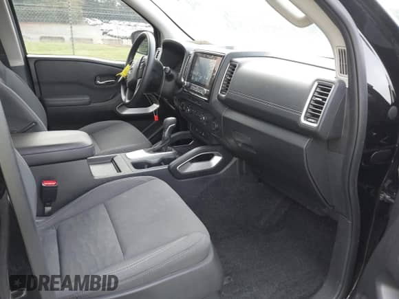 2023 Nissan Frontier SV with VIN 1N6ED1EK7PN609865, listed as a IAAI auction lot 42242070 with 56,462 mi miles and . Bid and sale history available at DreamBid. Image 5.