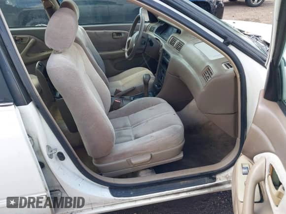 1997 Toyota Camry LE z VIN 4T1BF22K5VU922079, wystawiony jako IAAI lot #43326104 z przebiegiem Nie podano mil oraz . Historia ofert i sprzedaży dostępna na DreamBid. Obrazek 5.