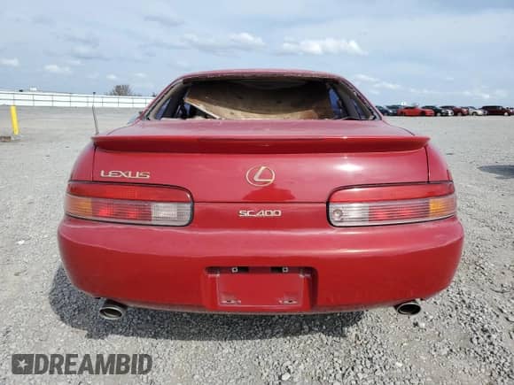 1996 Lexus SC 400 with VIN JT8CH32Y1T0051116, listed as a Copart auction lot 51518155 with 94,156 mi miles and Salvage title. Bid and sale history available at DreamBid. Image 6.