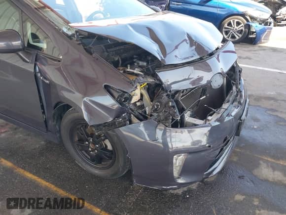 2015 Toyota Prius Four z VIN JTDKN3DU8F1952286, wystawiony jako IAAI lot #43014771 z przebiegiem 124 987 mil mil oraz . Historia ofert i sprzedaży dostępna na DreamBid. Obrazek 6.