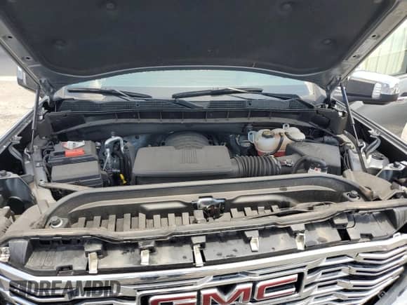 2023 GMC Sierra 1500 Denali z VIN 1GTUUGED7PZ270231, wystawiony jako Copart lot #58398935 z przebiegiem 14 572 mil mil oraz Nie do naprawy • Non repairable. Historia ofert i sprzedaży dostępna na DreamBid. Obrazek 11.