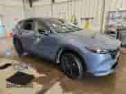 2023 Mazda CX-5 S Carbon Edition z VIN JM3KFBCM6P0194780, wystawiony jako Copart lot #70113105 z przebiegiem 50 849 mil mil oraz Szkoda całkowita • Salvage title. Historia ofert i sprzedaży dostępna na DreamBid. Obrazek 4.
