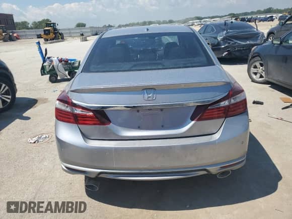 2017 Honda Accord Touring z VIN 1HGCR3F92HA038931, wystawiony jako Copart lot #69836615 z przebiegiem 145 045 mil mil oraz Szkoda całkowita • Salvage title. Historia ofert i sprzedaży dostępna na DreamBid. Obrazek 6.