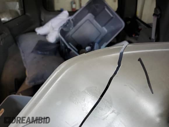 1999 Chevrolet Blazer LT z VIN 1GNDT13W4X2225140, wystawiony jako Copart lot #64834825 z przebiegiem Nie podano mil oraz Nie do naprawy • Non repairable. Historia ofert i sprzedaży dostępna na DreamBid. Obrazek 10.