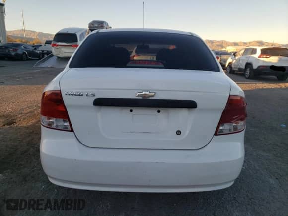 2005 Chevrolet Aveo LS z VIN KL1TD52665B331166, wystawiony jako Copart lot #79510054 z przebiegiem 165 471 mil mil oraz Szkoda całkowita • Salvage title. Historia ofert i sprzedaży dostępna na DreamBid. Obrazek 6.