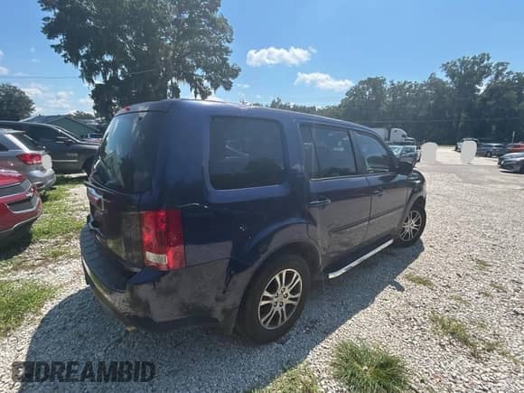 2013 Honda Pilot EX-L z VIN 5FNYF3H5XDB021433, wystawiony jako Copart lot #70961935 z przebiegiem 215 844 mil mil oraz Czysty tytuł • Clean title. Historia ofert i sprzedaży dostępna na DreamBid. Obrazek 4.