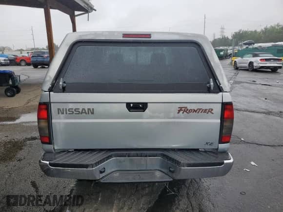 2000 Nissan Frontier XE with VIN 1N6DD21S4YC321371, listed as a Copart auction lot 55678675 with 99,775 mi miles and Salvage title. Bid and sale history available at DreamBid. Image 6.